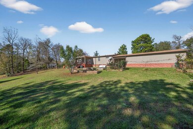 1018 County Road 4410, Reklaw, TX 75784 - photo 4