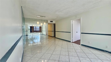 LONG VIEW FROM PATIO LOOKING TOWARD LIVING AND DINING ROOM