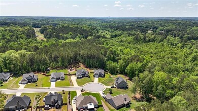 Aerial view with a residential view and a forest v