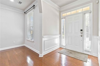 Foyer featuring a wealth of natural light, visible