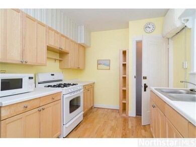 Updated kitchen includes Maple cabinets and recent