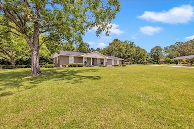 View of front of house with a front lawn