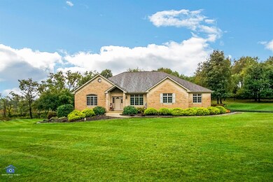 Beautiful brick ranch on 1 acre lot in Hunter's Trail