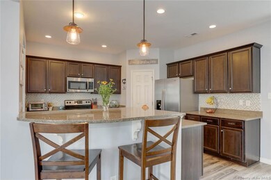 Kitchen is complete with a breakfast bar