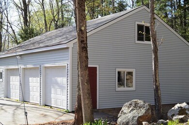 This oversized 3 bay GARAGE is a...