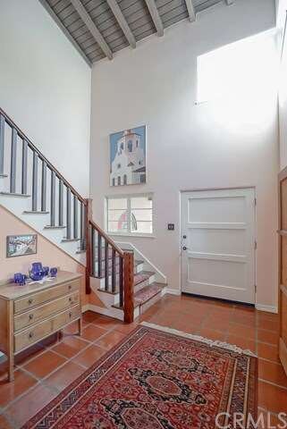 Open beam ceilings and windows at the second story