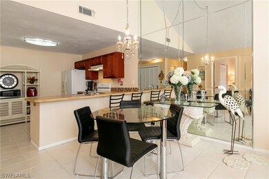 The kitchen is open to the dining area.