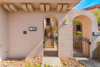 Doorway to property featuring stucco siding and a