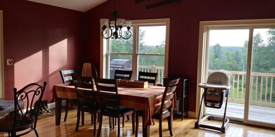 Dinning room with sliders to deck