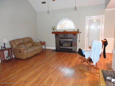 family room with hardwood floors,