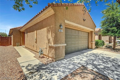 View of side of property featuring stucco siding,