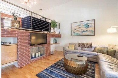 Living room with cable wiring to den area on main 