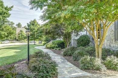 A pretty view of the slate walkway and mature land