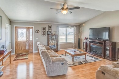 Vaulted Living Room w/ Ceiling Fan