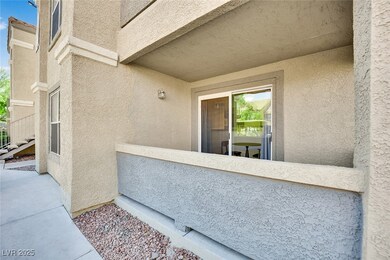 Doorway to property with stucco siding