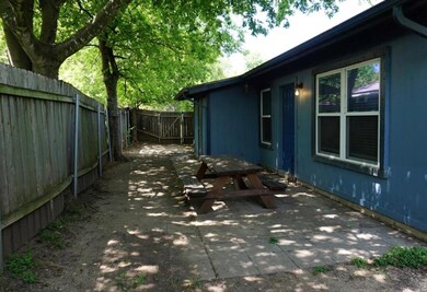 View of property exterior featuring a patio area 