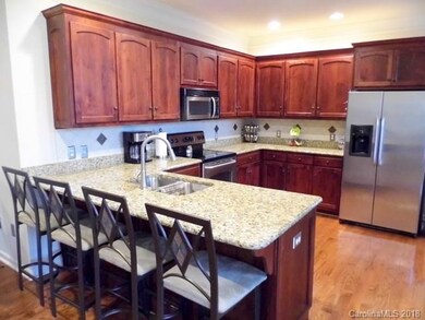 Kitchen with granite counter top & Stainless sink 