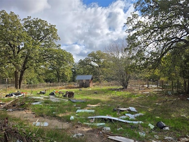 View of yard featuring a storage shed