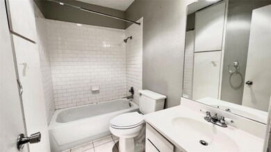 Full bathroom with shower / bath combination, van
