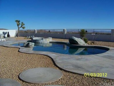 View of the Pebble Tech salt water pool and spa. f