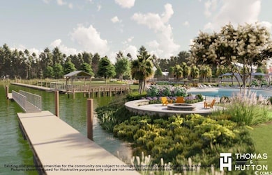 View of home's community featuring an outdoor fire pit, a boat dock, a water view, and a swimming pool