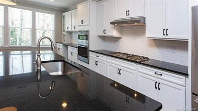 Large arched entertainment island with gorgeous gr