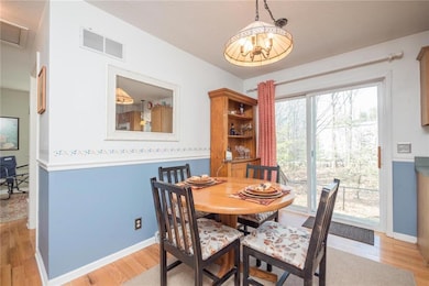 The dining room is adjacent to the...