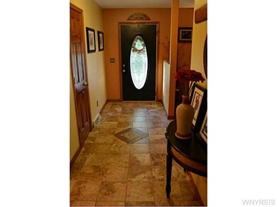 Foyer. Classy foyer/front entryway to wow your gue