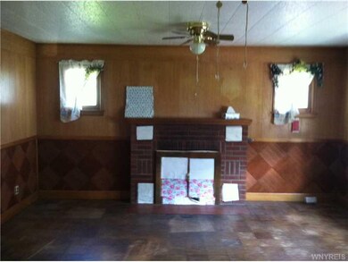 Bedroom. 1st floor bedroom w/fireplace.
