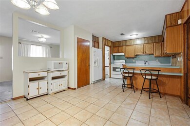 Kitchen and Breakfast area.  Pass thru to Living r