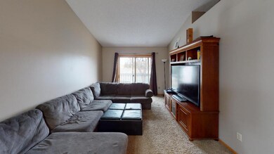 Living room w/walkout to the deck overlooking the 