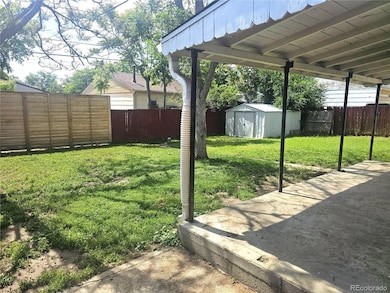 Covered patio and fenced yard