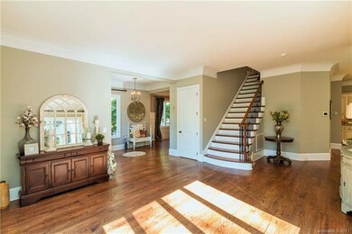 FAMILY ROOM AREA / HARDWOODS / IRON BALUSTERS & WO
