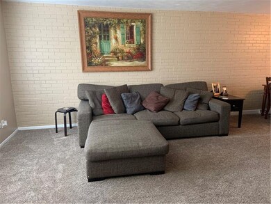 Beautiful living area with newer carpeting.