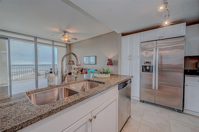 This kitchen boasts stunning granite countertops,