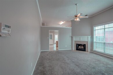 Featuring 11' ceiling with crown molding. Wood tri