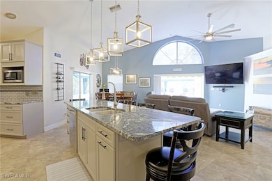 Kitchen featuring stainless steel appliances, ston