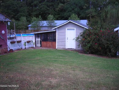 Shop with screened in porch