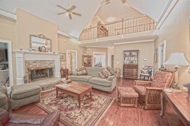 LOVELY LIVING ROOM COMES WITH HARDWOOD FLOORING AND A BRICK FIREPLACE! 1310 SHAGBARK TRAIL MURFREESBORO, TN 37130
