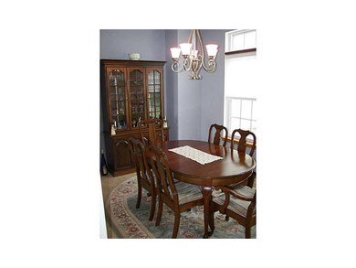 Dining Area. Formal dining room off kitchen with s