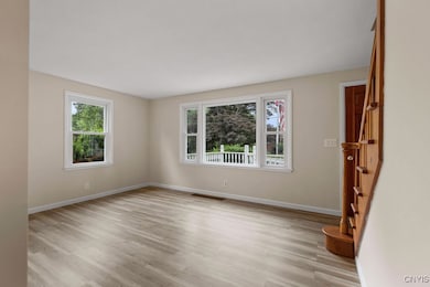 The living room is located at the front, right cor