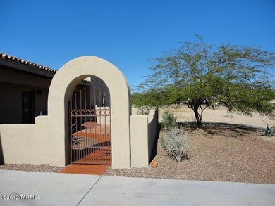 Arched Entry to Front Courtyard