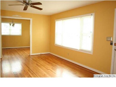 Open and cheery with beautiful hardwoods.