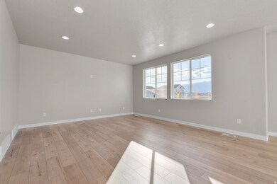 Unfurnished room with recessed lighting and light wood-type flooring