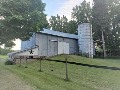 Barn with fenced pastures