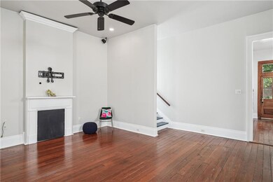 LIVING ROOM/ INTO KITCHEN VIEW: ORIGINAL HARDWOOD 