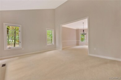 Living Room with casement opening to the dining ro