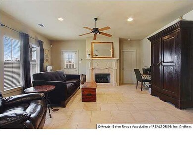 Living room. Fireplace is center focal point. Cera
