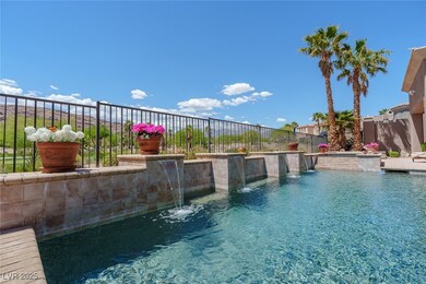 Sparkling pool accented by water features