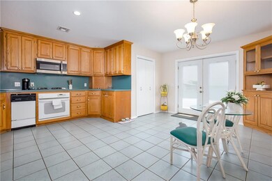 Large kitchen with plenty of storage and natural l